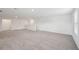 Spacious carpeted loft area with ample natural light and neutral walls perfect for a Gathering room or recreational space at 14035 Kelly Park Ct, Parrish, FL 34219