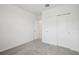Empty bedroom with neutral carpet, a closet, and a bright, fresh feel at 7736 Gilchrist Springs Dr, Parrish, FL 34219