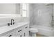Well-lit bathroom featuring a shower-tub combination and a vanity with a modern faucet at 4284 Persian Ln, North Port, FL 34287