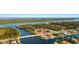 Waterfront home with boat dock access to gulf, neighborhood, and beach through small bridge access at 9277 St Paul Dr, Port Charlotte, FL 33981
