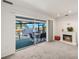 Bedroom view to the waterfront with a fireplace and a patio at 9277 St Paul Dr, Port Charlotte, FL 33981
