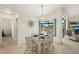 Charming dining area with waterfront views and decorative lighting at 9277 St Paul Dr, Port Charlotte, FL 33981