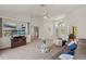 Bright living room with high ceilings and view through french doors at 9277 St Paul Dr, Port Charlotte, FL 33981