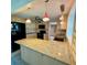 Modern kitchen featuring granite countertops, stainless steel appliances, and ample storage at 5428 Nutmeg Ave, Sarasota, FL 34231