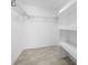 Well-organized walk-in closet with shelving and ample storage space at 5474 Dominica Cir, Sarasota, FL 34233