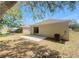 Backyard with concrete patio, lawn, and privacy fence at 923 Brenton Leaf Dr, Ruskin, FL 33570