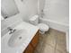 Clean bathroom featuring a vanity sink, toilet, and bathtub with tile floors at 923 Brenton Leaf Dr, Ruskin, FL 33570