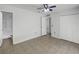 Bedroom featuring closet, tile floors, and access to en-suite bathroom at 923 Brenton Leaf Dr, Ruskin, FL 33570