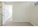 Bedroom with plush carpet and view to the other rooms with an air conditioning unit at 1314 Larsen Ln, Tampa, FL 33619