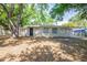 Charming single-story home with mature trees providing ample shade at 1314 Larsen Ln, Tampa, FL 33619