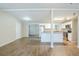 Open-concept living and kitchen area with stainless steel appliances at 1314 Larsen Ln, Tampa, FL 33619