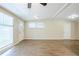Spacious living room with ample natural light, new floors, and neutral walls at 1314 Larsen Ln, Tampa, FL 33619