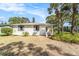 Charming single-story home with a well-maintained front yard and lovely curb appeal at 4925 Alcazar S Way, St Petersburg, FL 33712