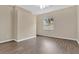 Comfortable bedroom featuring wood floors, neutral walls, and a ceiling fan at 12219 Hunters Lake Dr, New Port Richey, FL 34654