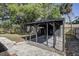 Covered outdoor area in the fenced in backyard at 1807 49Th W Ave, Bradenton, FL 34207