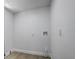 Unfinished basement space with outlets, smooth walls, and vinyl flooring at 1807 49Th W Ave, Bradenton, FL 34207