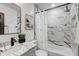 Elegant bathroom with marble countertops, stylish fixtures, and a shower-tub combo at 1807 49Th W Ave, Bradenton, FL 34207