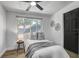 Bedroom with a cozy bed, large window, and a calming, neutral color scheme at 1807 49Th W Ave, Bradenton, FL 34207