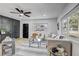 Bright living room featuring modern furniture, neutral decor, and ample natural light at 1807 49Th W Ave, Bradenton, FL 34207
