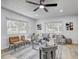 Bright living room featuring modern furniture, neutral decor, and ample natural light at 1807 49Th W Ave, Bradenton, FL 34207