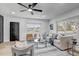 Bright living room featuring modern furniture, neutral decor, and ample natural light at 1807 49Th W Ave, Bradenton, FL 34207