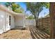 Private backyard with wooden fence and brick-paved patio at 1820 Marvy Ave, Tampa, FL 33612