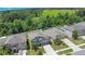 Charming two-story home with well-maintained lawn, driveway, and beautiful surrounding green space at 3504 Kearsney Abbey Cir, Dover, FL 33527