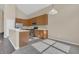 Bright kitchen with stainless steel appliances, ample cabinets, and large island at 4432 Huddlestone Dr, Wesley Chapel, FL 33545