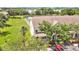 Well-maintained community with a beautiful pond view and mature trees enhancing the landscape at 4722 67Th N Ave, Pinellas Park, FL 33781