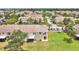 Scenic view of multi-Gathering homes with well-maintained lawns and ample parking at 4722 67Th N Ave, Pinellas Park, FL 33781