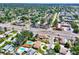 An aerial view showcasing the property's location, lush surroundings, and neighborhood amenities at 7824 Starkey Rd, Seminole, FL 33777