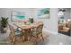 Virtually staged dining room featuring stylish decor, an open design, and natural light at 7824 Starkey Rd, Seminole, FL 33777