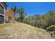 Backyard with a fence, trees, and view of the side of the building at 11901 4Th N St # 2107, St Petersburg, FL 33716