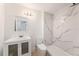 Modern bathroom showcasing a sleek vanity, a shower with stylish marble-look tiling at 11901 4Th N St # 2107, St Petersburg, FL 33716
