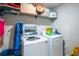 Efficient laundry room with modern washer and dryer at 11910 Field Thistle Ct, Riverview, FL 33579