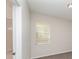 This bedroom features carpet and a window providing natural light at 13188 Royal Pines Ave, Riverview, FL 33579