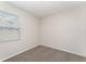 Bedroom featuring neutral walls, carpet, and a bright window at 13188 Royal Pines Ave, Riverview, FL 33579
