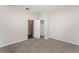 Bedroom featuring neutral walls, carpet, and a closet at 13188 Royal Pines Ave, Riverview, FL 33579