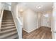 Stairway and entryway featuring hard surface floors at 13188 Royal Pines Ave, Riverview, FL 33579