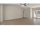 Light-filled living room with a neutral color palette and hardwood flooring at 621 Erin Way, Brooksville, FL 34601