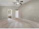 Spacious main bedroom with connecting bathroom and closet at 621 Erin Way, Brooksville, FL 34601
