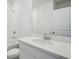 Clean bathroom with white vanity, chrome fixtures, and a shower-tub combination at 14118 Crutchfield Ct, Parrish, FL 34219