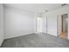 New bedroom with carpet flooring, natural light, and ensuite bathroom at 14118 Crutchfield Ct, Parrish, FL 34219