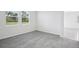 Bright bedroom featuring carpet flooring, and natural light from the window at 14118 Crutchfield Ct, Parrish, FL 34219