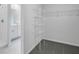 Walk-in closet adjacent to the bathroom provides convenient storage solutions at 14118 Crutchfield Ct, Parrish, FL 34219