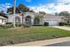 Charming single-story home with well-manicured landscaping and a two-car garage at 470 Bermuda Isles Cir, Venice, FL 34292