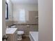 Bathroom featuring vanity, and shower-tub combination at 912 Magnolia Dr, Clearwater, FL 33756