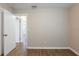 Bedroom featuring wood-look flooring and neutral paint at 912 Magnolia Dr, Clearwater, FL 33756