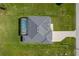Aerial shot of this beautiful new construction home that boasts a pool and large paver driveway at 193 Rotonda S Blvd, Rotonda West, FL 33947