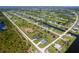 Aerial view of this community with many homes situated along canals and lush wooded areas at 193 Rotonda S Blvd, Rotonda West, FL 33947